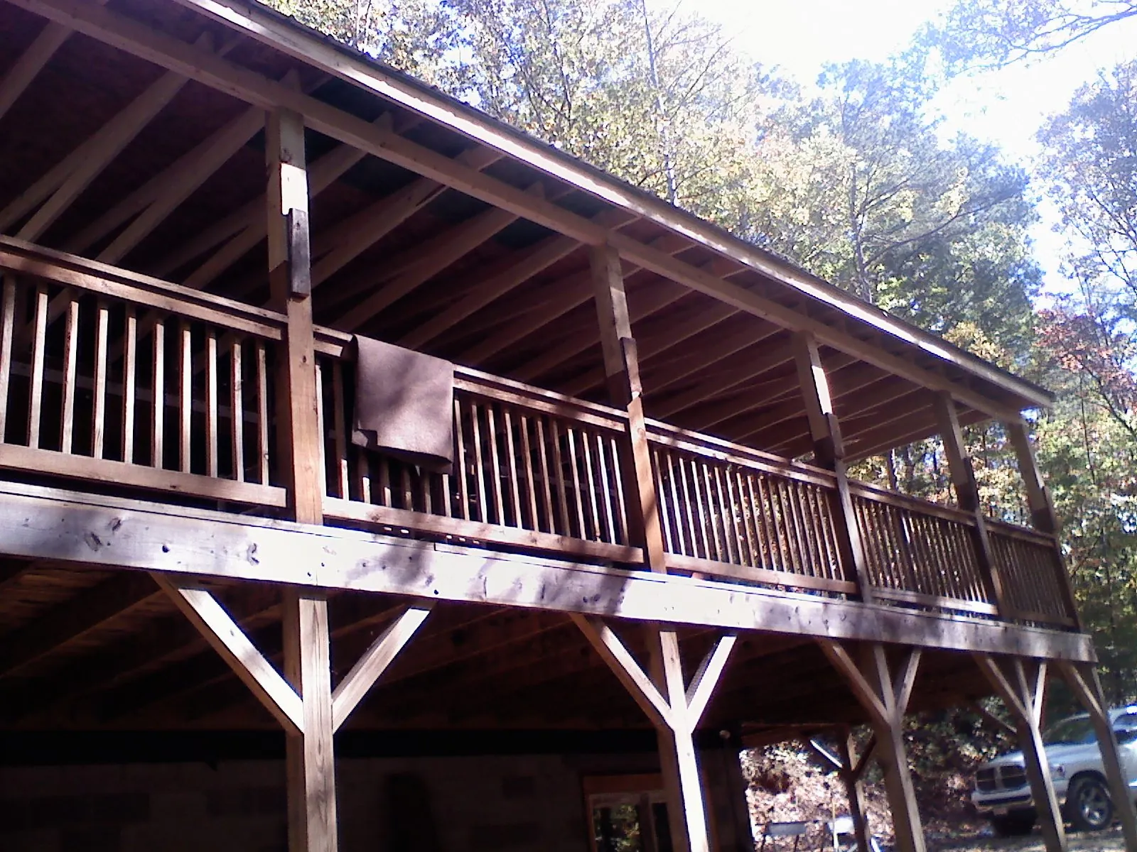 Timber framing under a new elevated porch and deck — Roof Leak Repair in Collettsville by Roofing Brothers